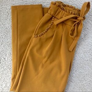 High-waisted mustard frill pant.
